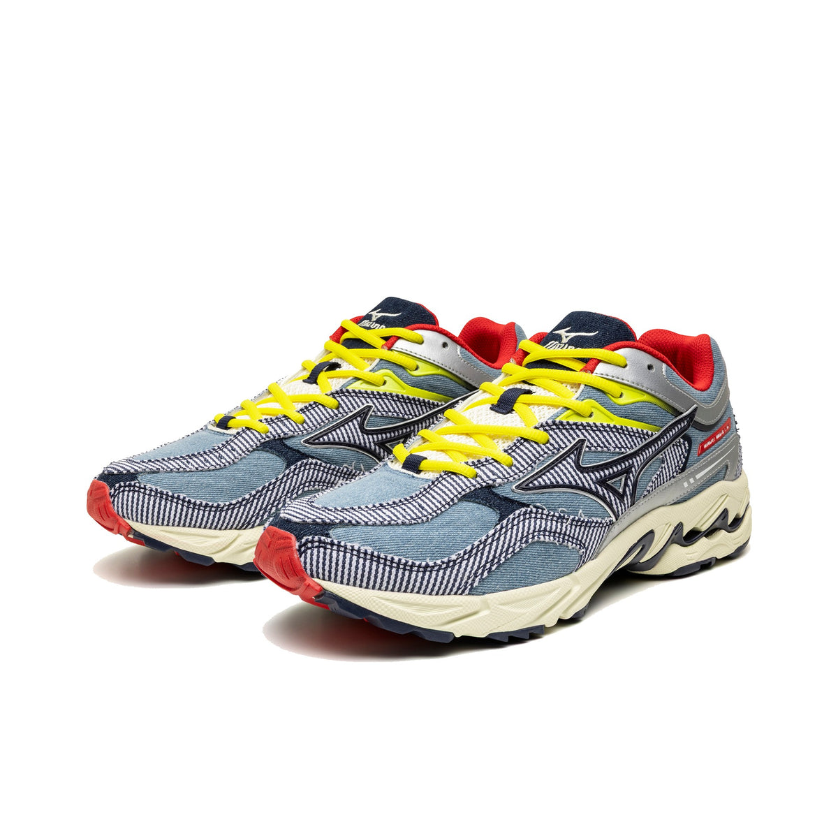 Mizuno Wave MG4 LS Paar schräg von vorne mit gelben Schnürsenkeln